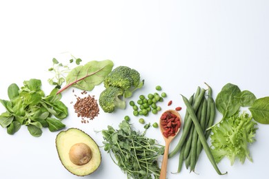 Photo of Superfood. Different healthy products on white background, flat lay. Space for text