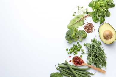 Photo of Superfood. Different healthy products on white background, flat lay. Space for text
