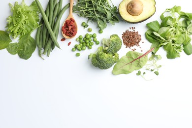 Photo of Superfood. Different healthy products on white background, flat lay. Space for text