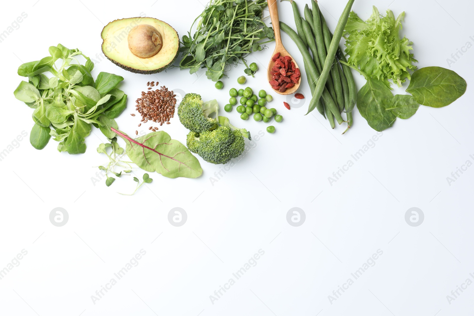 Superfood. Different healthy products on white background, flat lay. Space for text Photo of Superfood. Different healthy products on white background, flat lay. Space for text