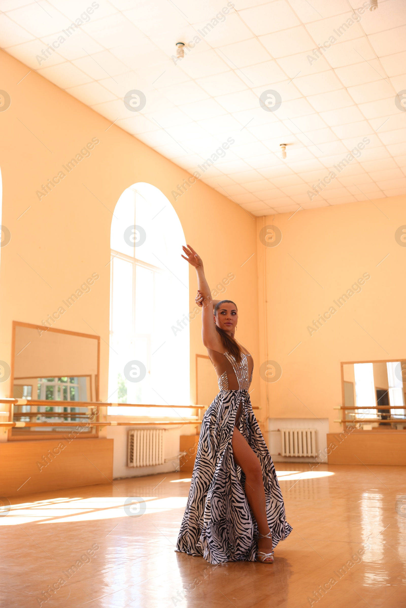 Professional dancer training choreography in dance studio Photo of Professional dancer training choreography in dance studio