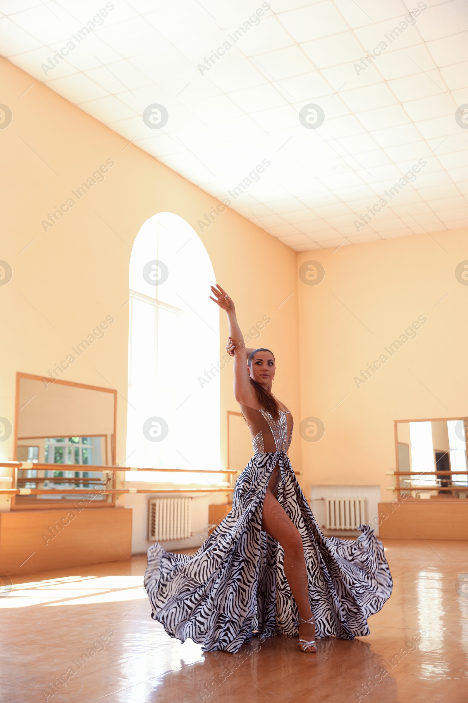 Professional dancer training choreography in dance studio Photo of Professional dancer training choreography in dance studio