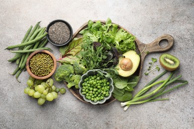 Photo of Superfood. Different healthy products on light grey table, flat lay
