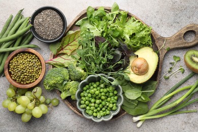 Photo of Superfood. Different healthy products on light grey table, flat lay