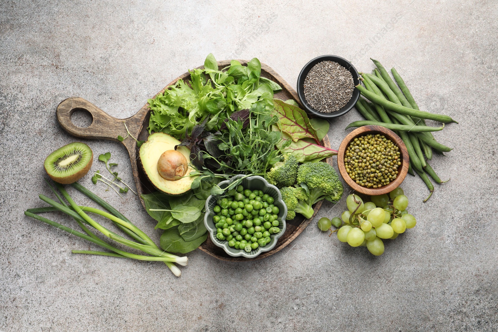 Superfood. Different healthy products on light grey table, flat lay Photo of Superfood. Different healthy products on light grey table, flat lay