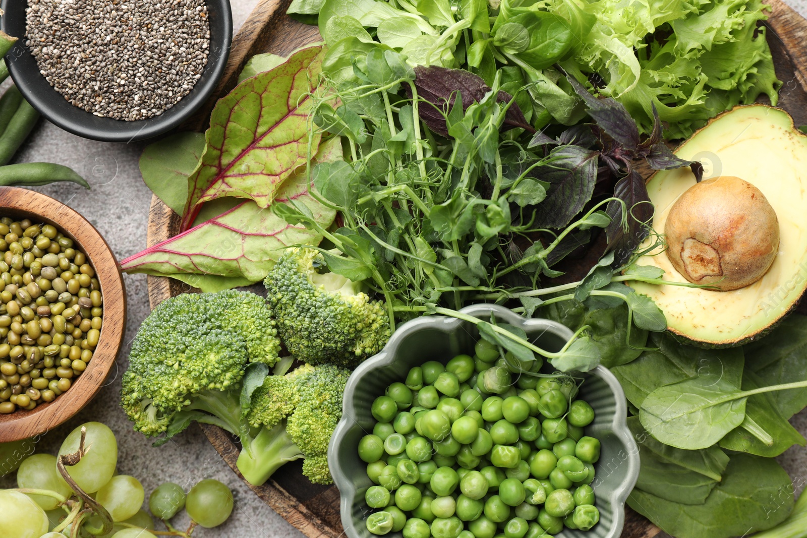 Photo of Superfood. Different healthy products on light grey table, flat lay