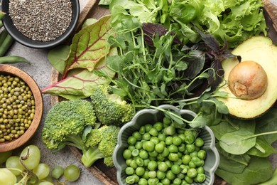 Photo of Superfood. Different healthy products on light grey table, flat lay