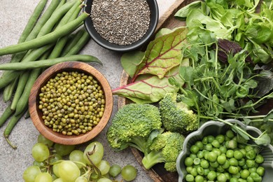 Photo of Superfood. Different healthy products on light grey table, flat lay
