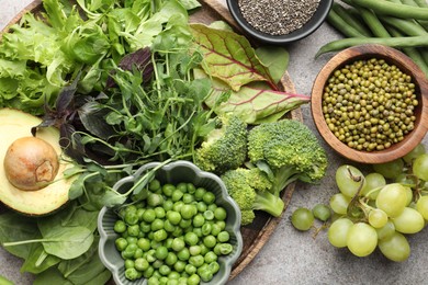 Photo of Superfood. Different healthy products on light grey table, flat lay