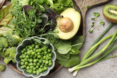 Photo of Superfood. Different healthy products on light grey table, top view