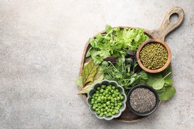 Photo of Superfood. Different healthy products on light grey table, top view. Space for text