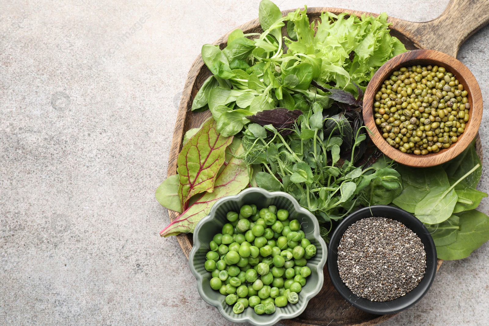 Photo of Superfood. Different healthy products on light grey table, top view. Space for text