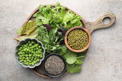 Photo of Superfood. Different healthy products on light grey table, top view