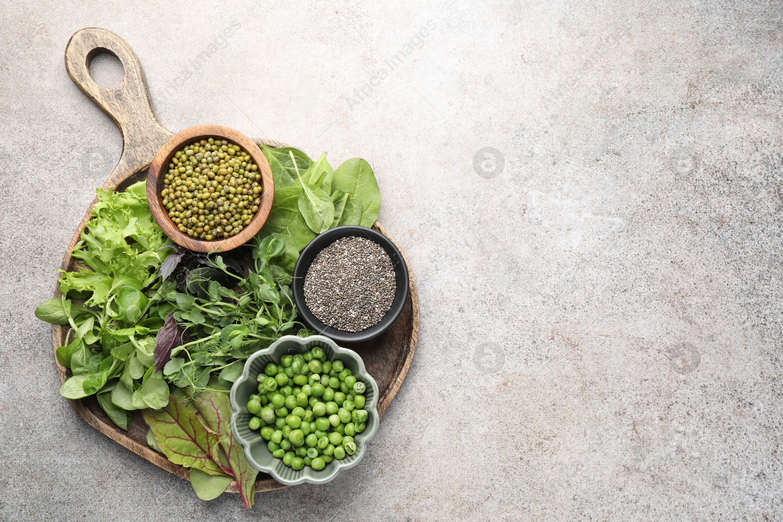 Photo of Superfood. Different healthy products on light grey table, top view. Space for text