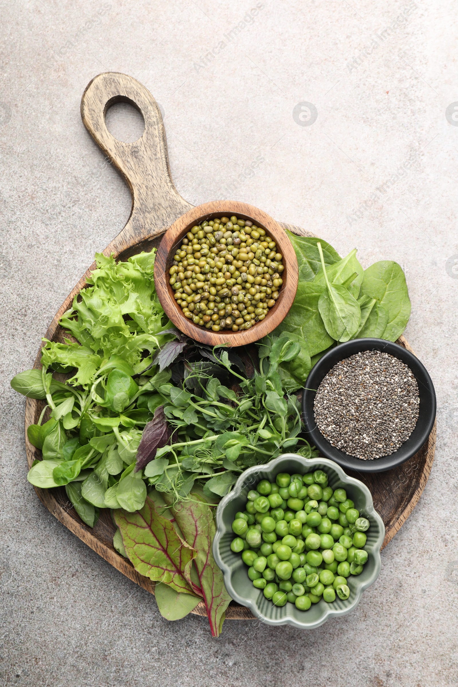 Photo of Superfood. Different healthy products on light grey table, top view