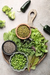 Photo of Superfood. Different healthy products on light grey table, top view