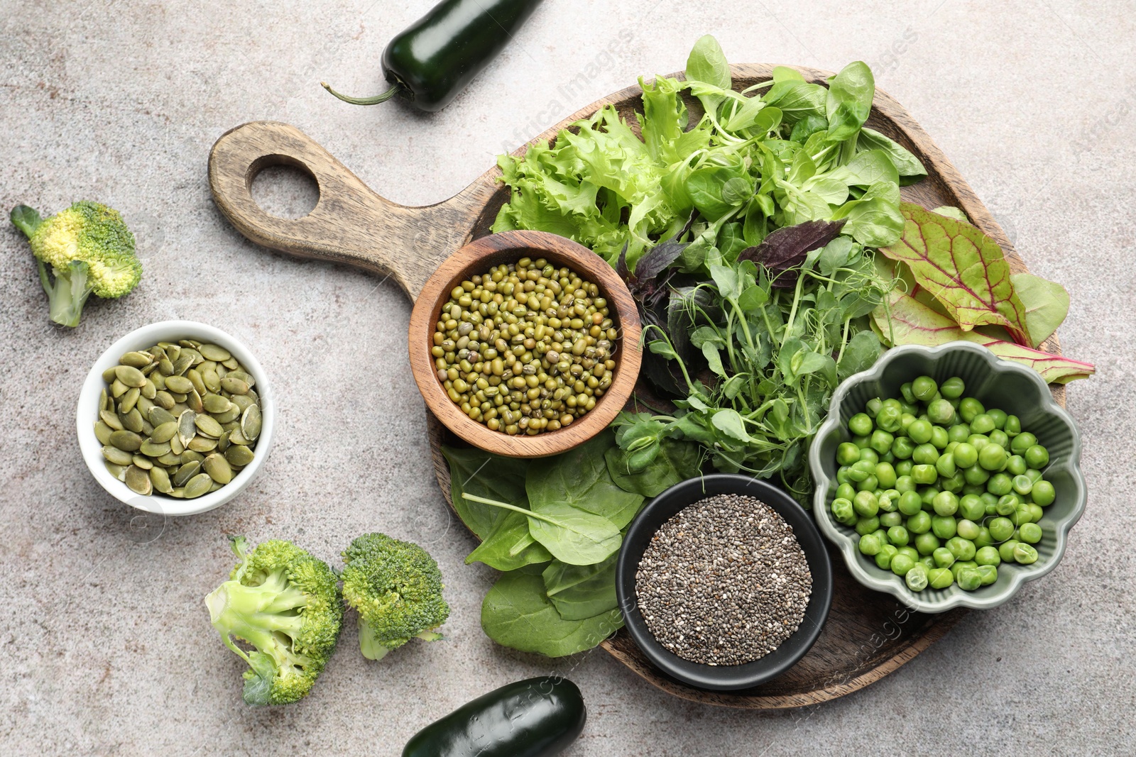 Photo of Superfood. Different healthy products on light grey table, flat lay