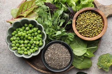 Photo of Superfood. Different healthy products on light grey table, top view