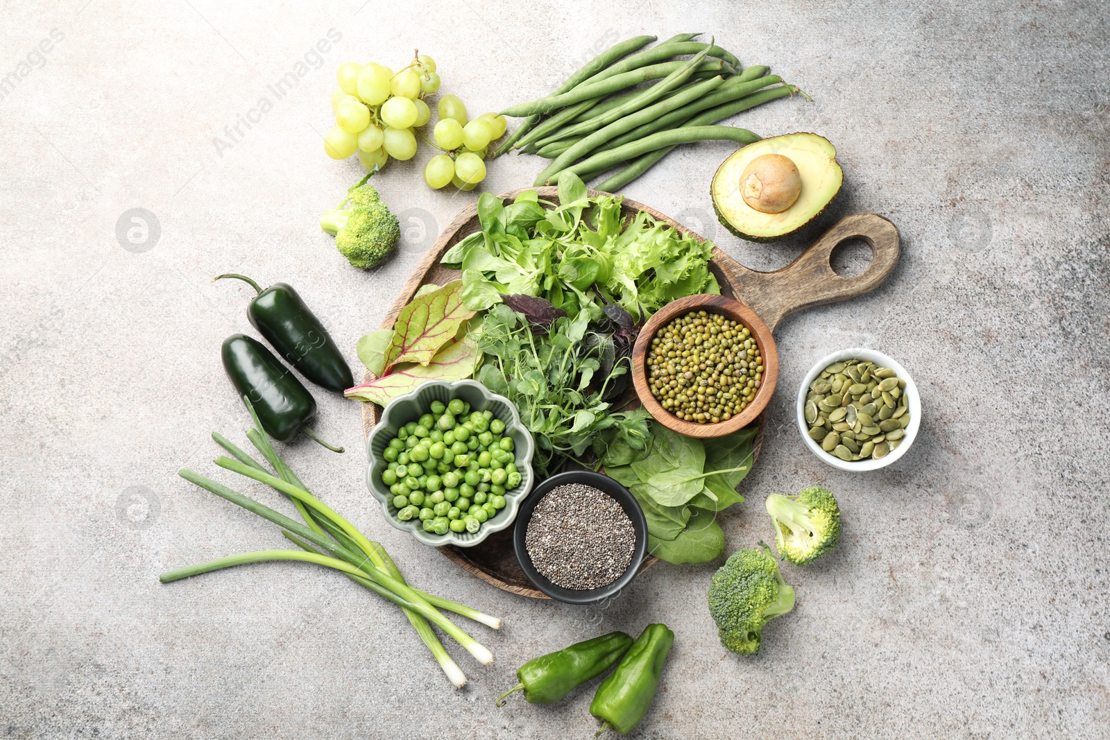 Photo of Superfood. Different healthy products on light grey table, flat lay