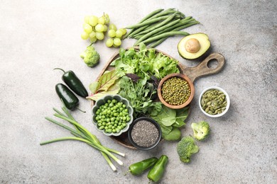 Photo of Superfood. Different healthy products on light grey table, flat lay