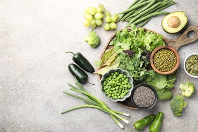Photo of Superfood. Different healthy products on light grey table, flat lay. Space for text