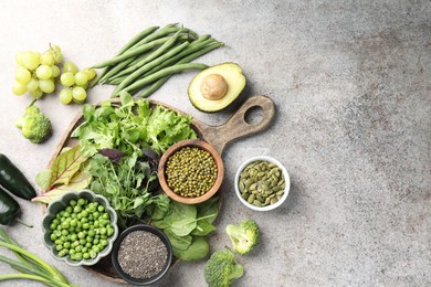 Photo of Superfood. Different healthy products on light grey table, flat lay. Space for text