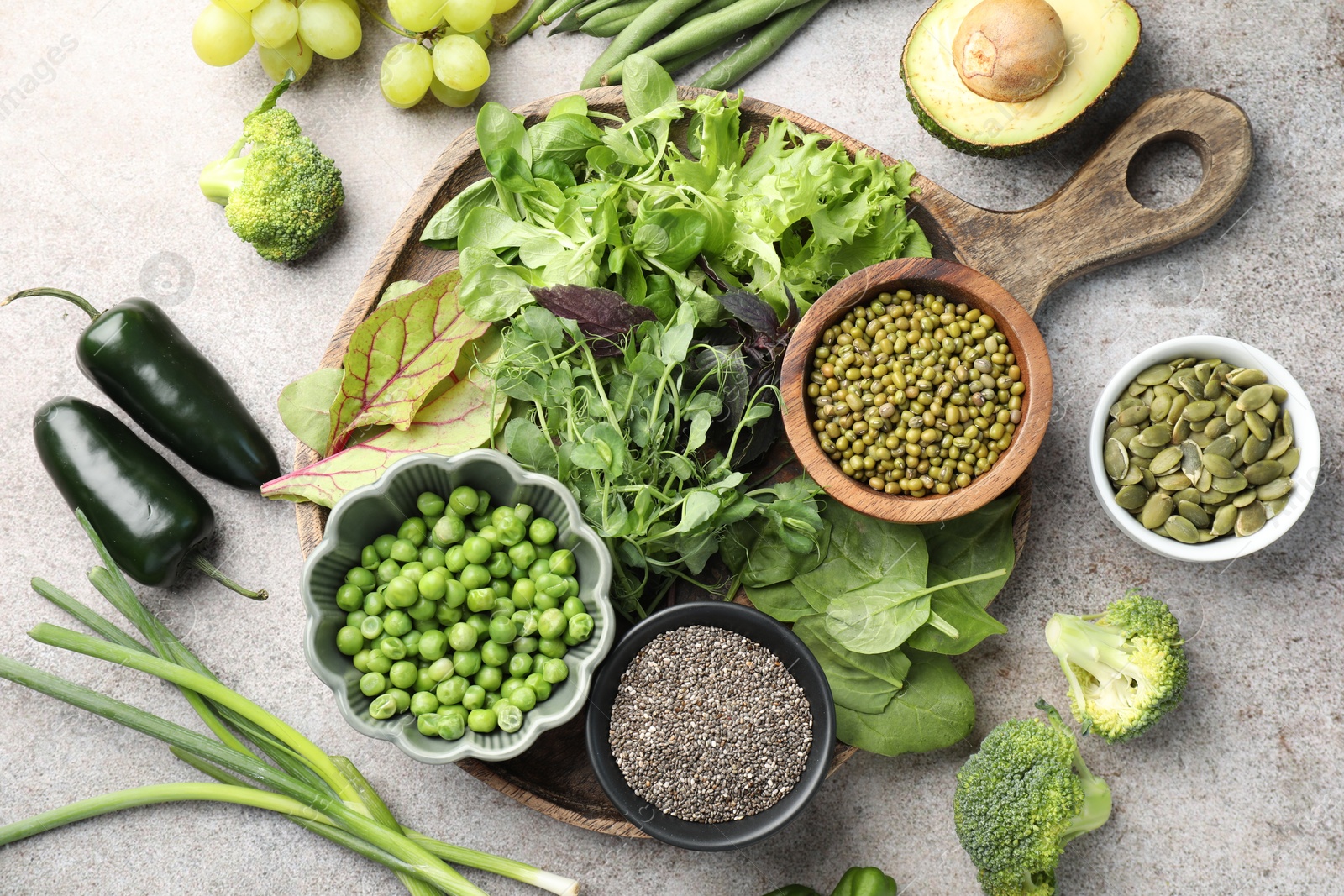 Superfood. Different healthy products on light grey table, flat lay Photo of Superfood. Different healthy products on light grey table, flat lay