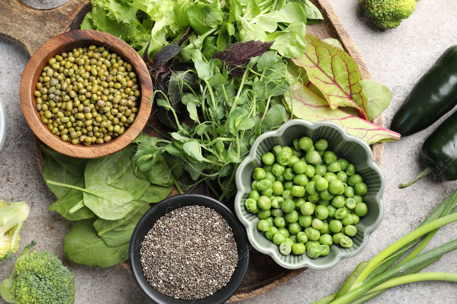 Photo of Superfood. Different healthy products on light grey table, flat lay