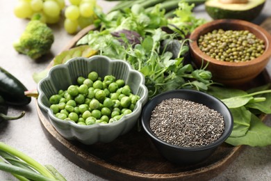 Photo of Superfood. Different healthy products on light grey table, closeup