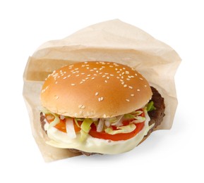 Photo of One delicious burger with cheese, tomato, lettuce and patty in takeaway package isolated on white. Tasty fast food