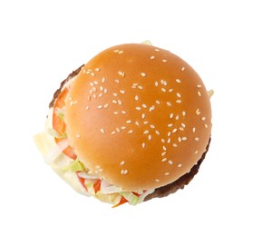 Photo of One delicious burger with cheese, tomato, lettuce and patty isolated on white, top view. Tasty fast food