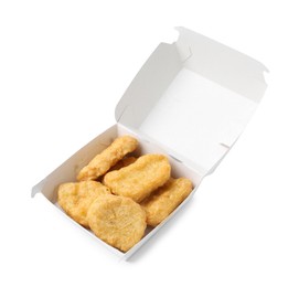 Photo of Delicious nuggets in takeaway package isolated on white. Tasty fast food