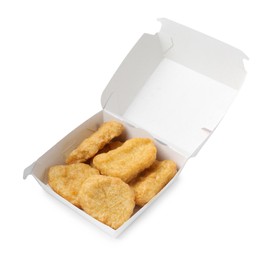 Photo of Delicious nuggets in takeaway package isolated on white. Tasty fast food