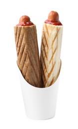 Photo of Delicious French hot dogs in takeaway package isolated on white. Tasty fast food