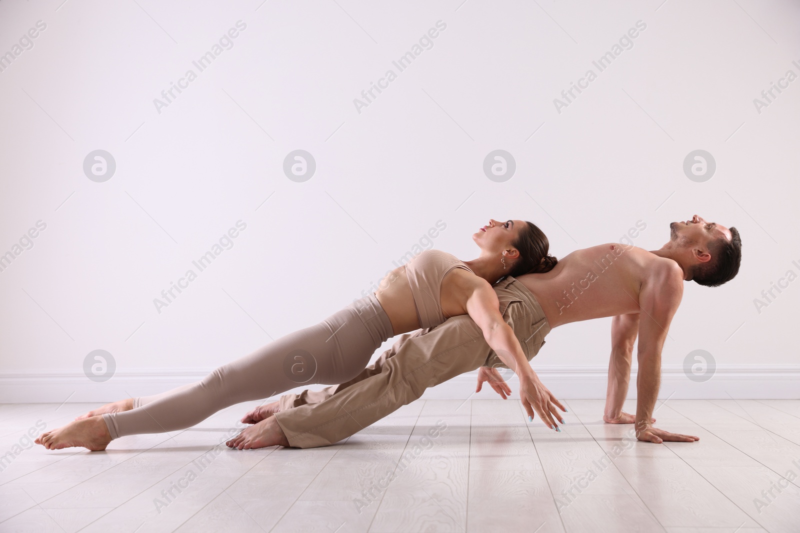 Couple of professional dancers training in studio. Space for text Photo of Couple of professional dancers training in studio. Space for text