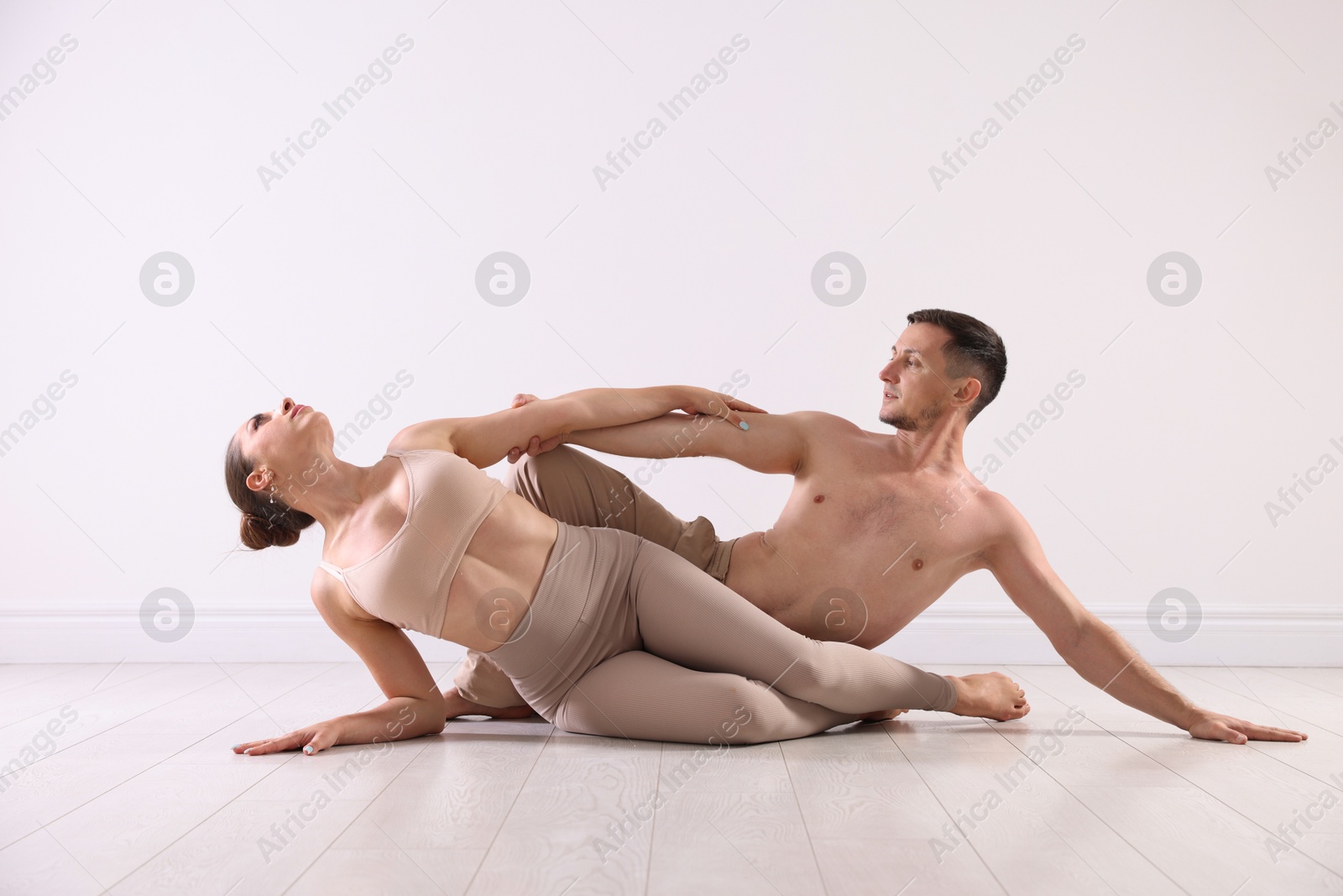 Photo of Couple of professional dancers training in studio