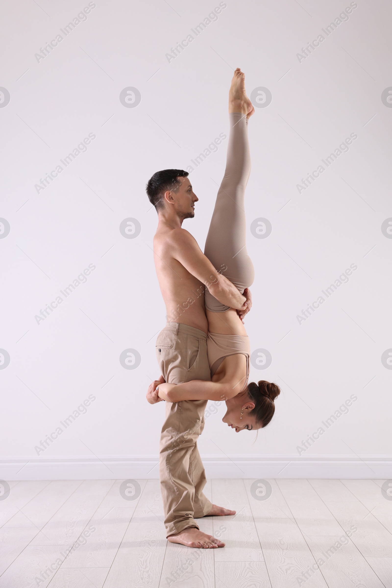 Photo of Couple of professional dancers training in studio