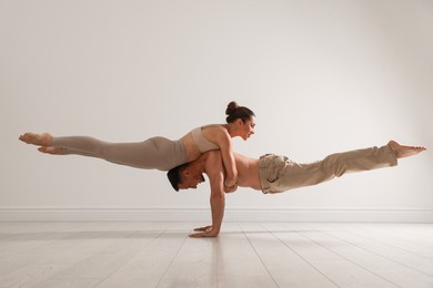 Photo of Couple of professional dancers training in studio