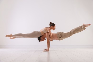 Photo of Couple of professional dancers training in studio