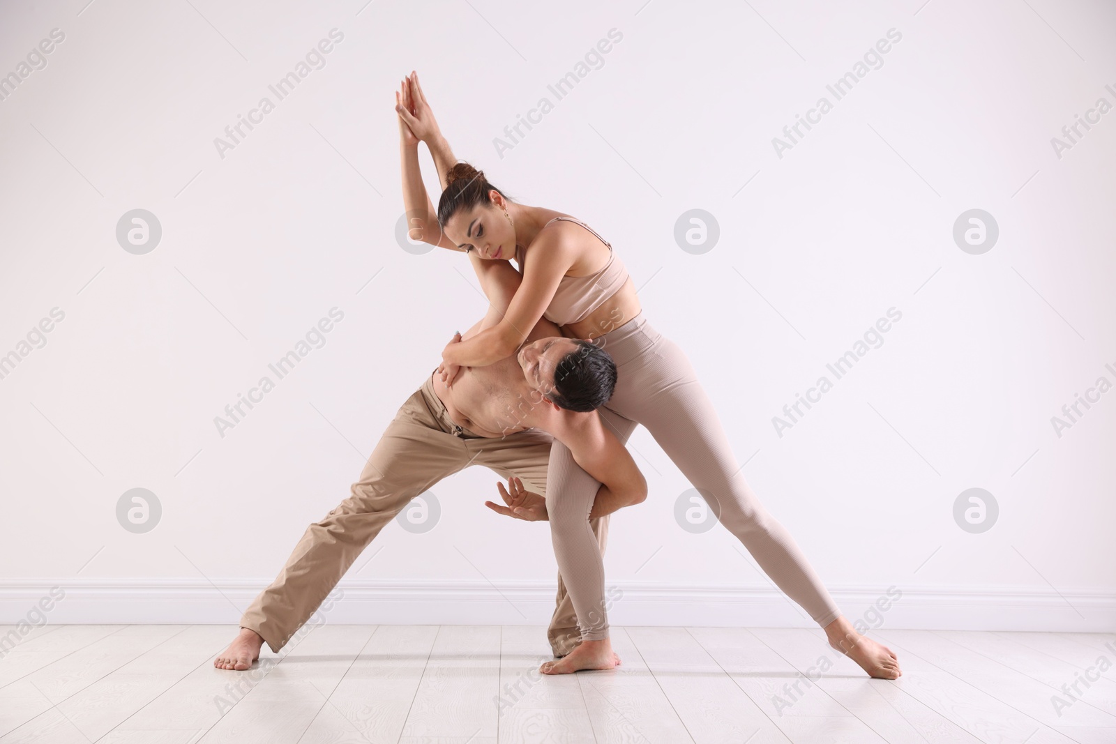 Photo of Couple of professional dancers training in studio