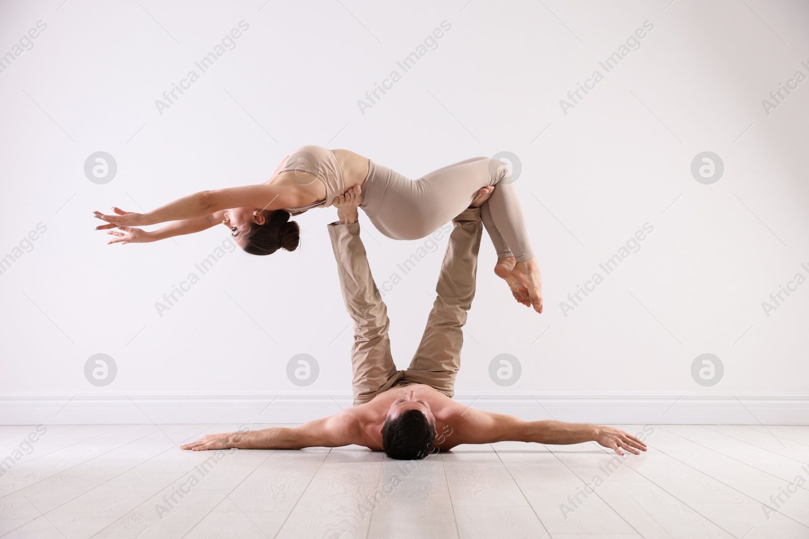 Photo of Couple of professional dancers training in studio