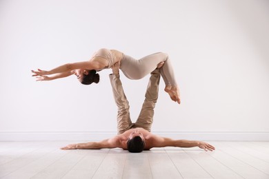 Photo of Couple of professional dancers training in studio