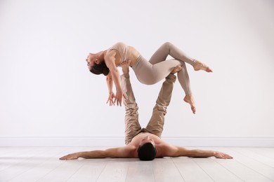 Photo of Couple of professional dancers training in studio
