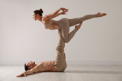 Photo of Couple of professional dancers training in studio