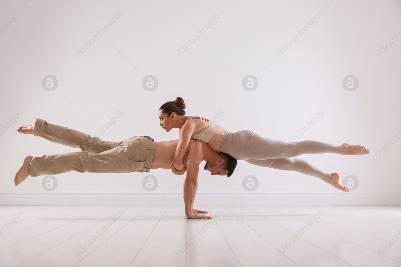 Photo of Couple of professional dancers training in studio