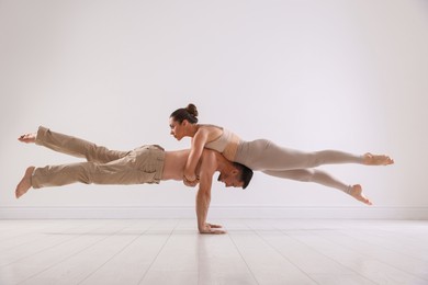 Photo of Couple of professional dancers training in studio