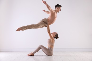 Photo of Couple of professional dancers training in studio