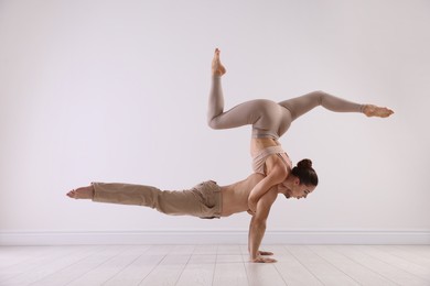 Photo of Couple of professional dancers training in studio