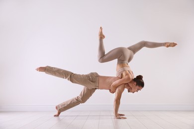 Photo of Couple of professional dancers training in studio