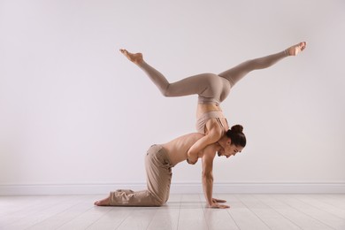 Photo of Couple of professional dancers training in studio